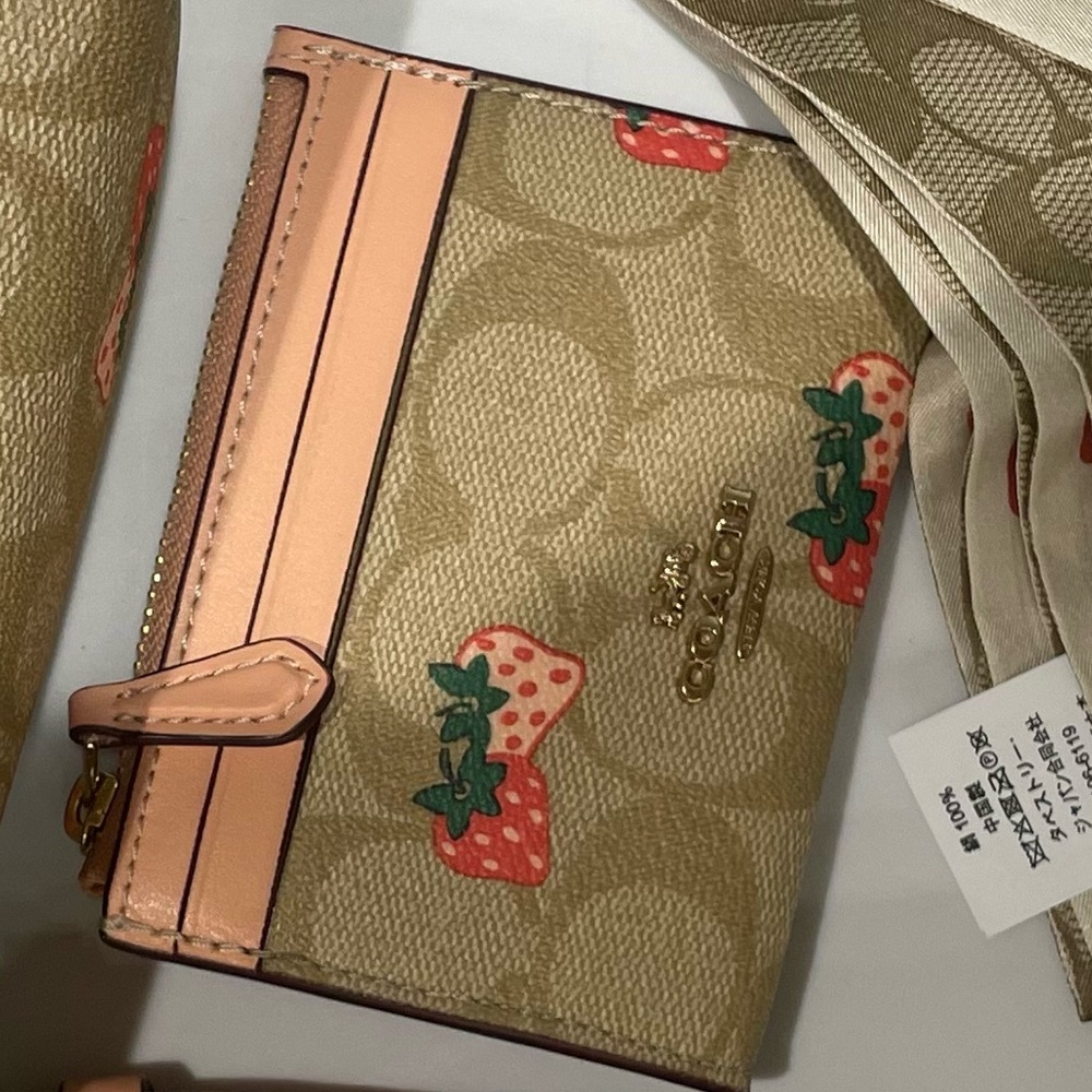 Coach strawberry skinny id case